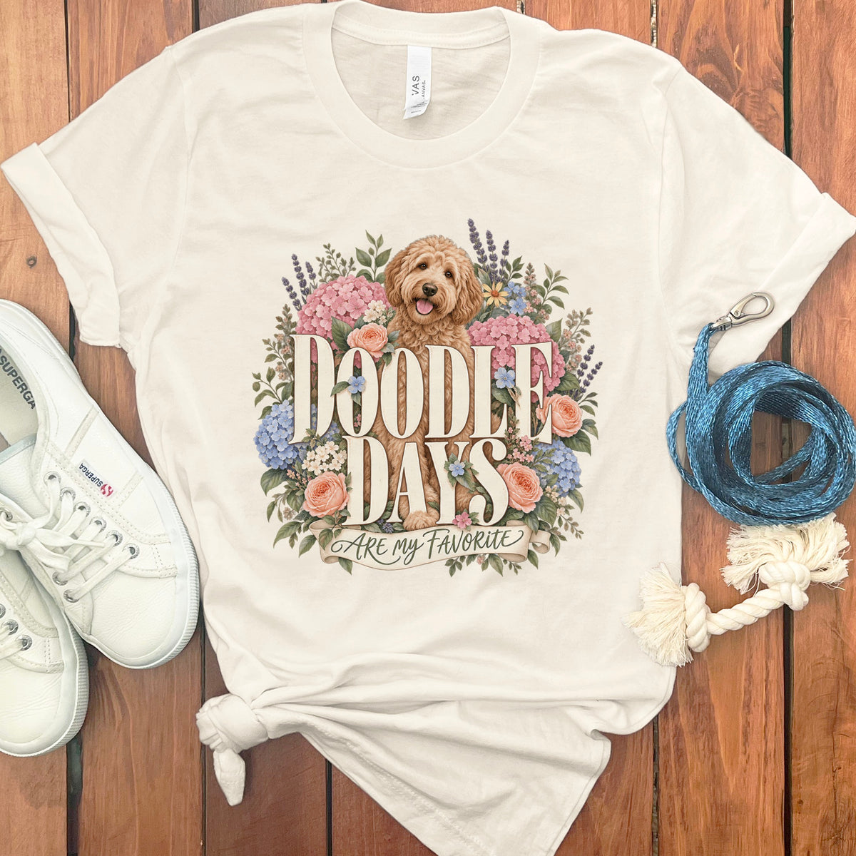 White t-shirt with a floral design and the text "Doodle Days Are My Favorite".