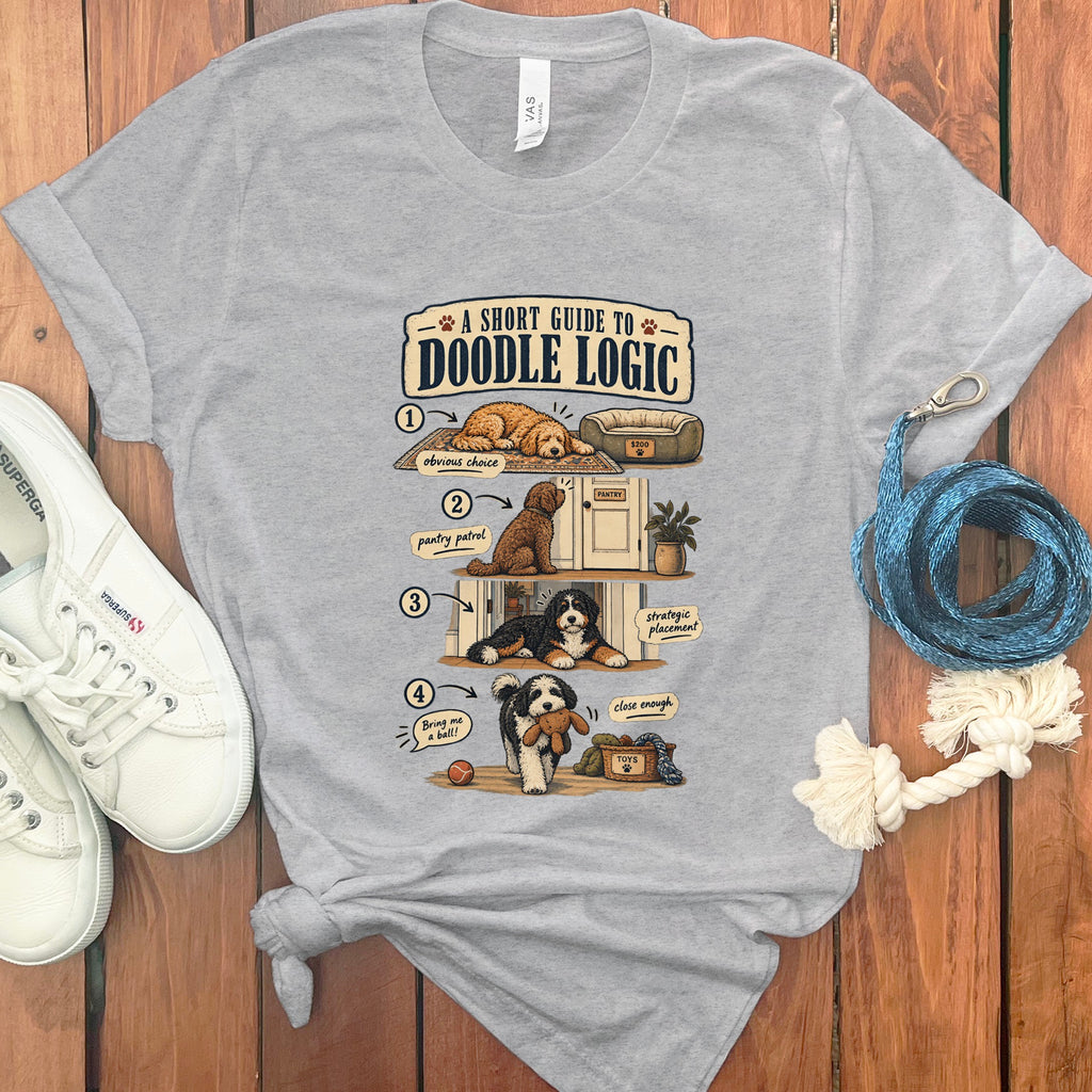 Grey t-shirt with "A Short Guide to Doodle Logic" graphic featuring four illustrated dogs.
