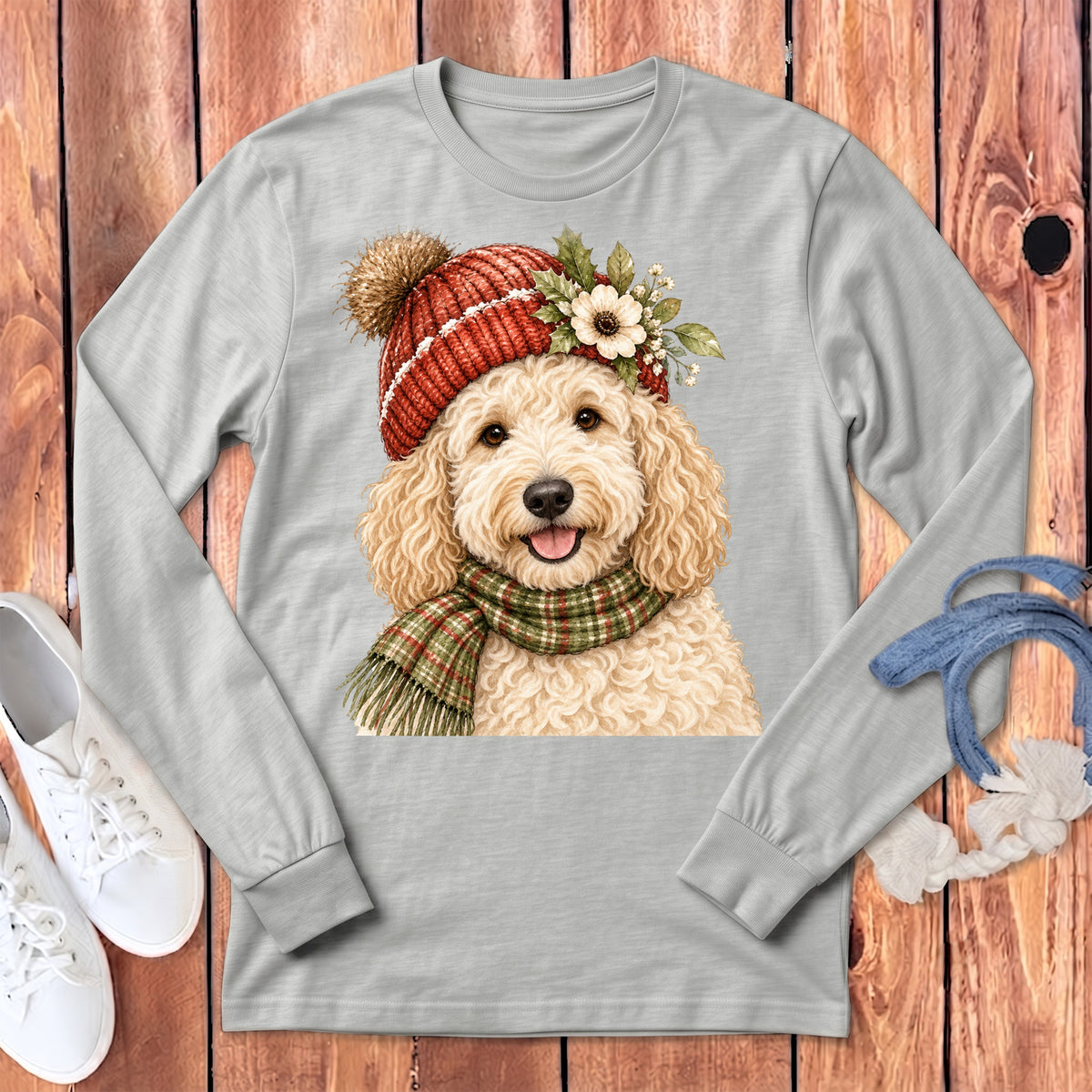 Light grey long-sleeve shirt with a watercolor print of a goldendoodle wearing a winter hat and scarf.