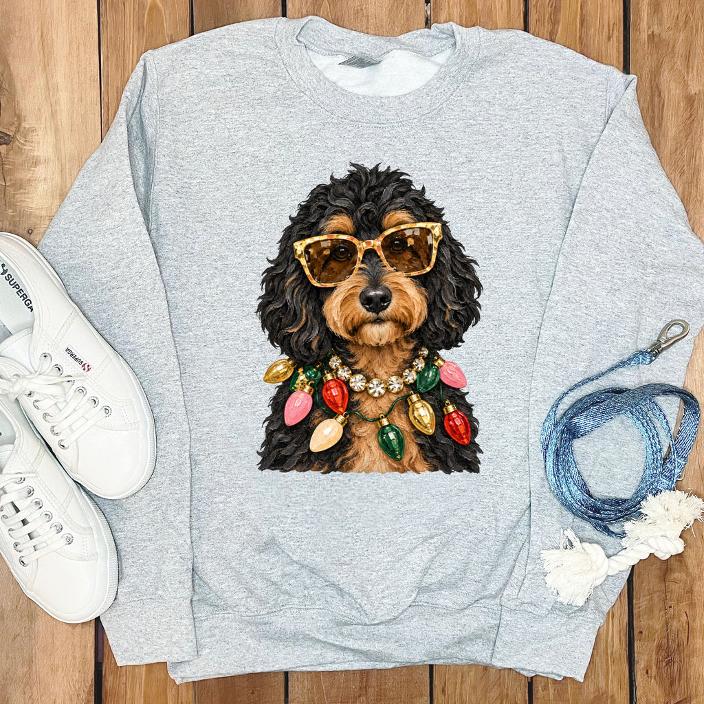 Grey sweatshirt with a dog wearing sunglasses and Christmas lights graphic.
