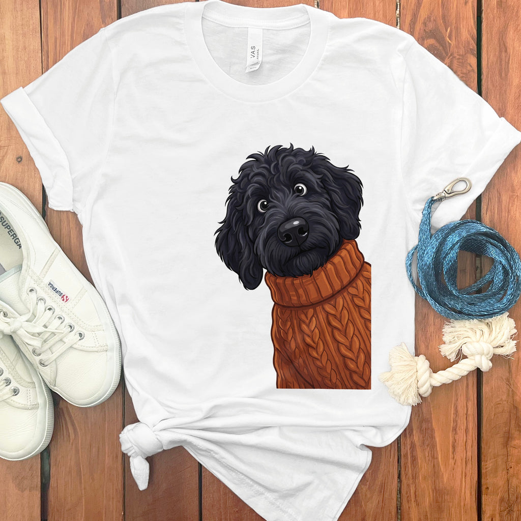 Illustration of a black dog wearing a brown cable-knit sweater on a white t-shirt.
