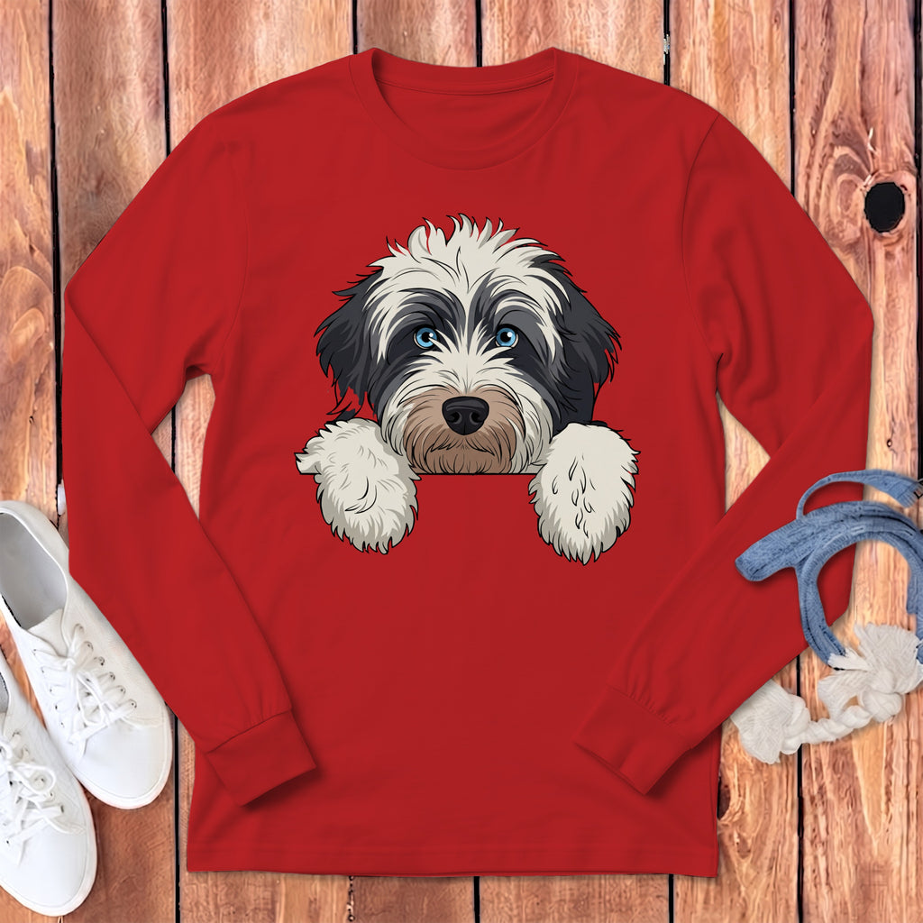 Red long-sleeve shirt with a cartoon dog's head peeking over the collar.
