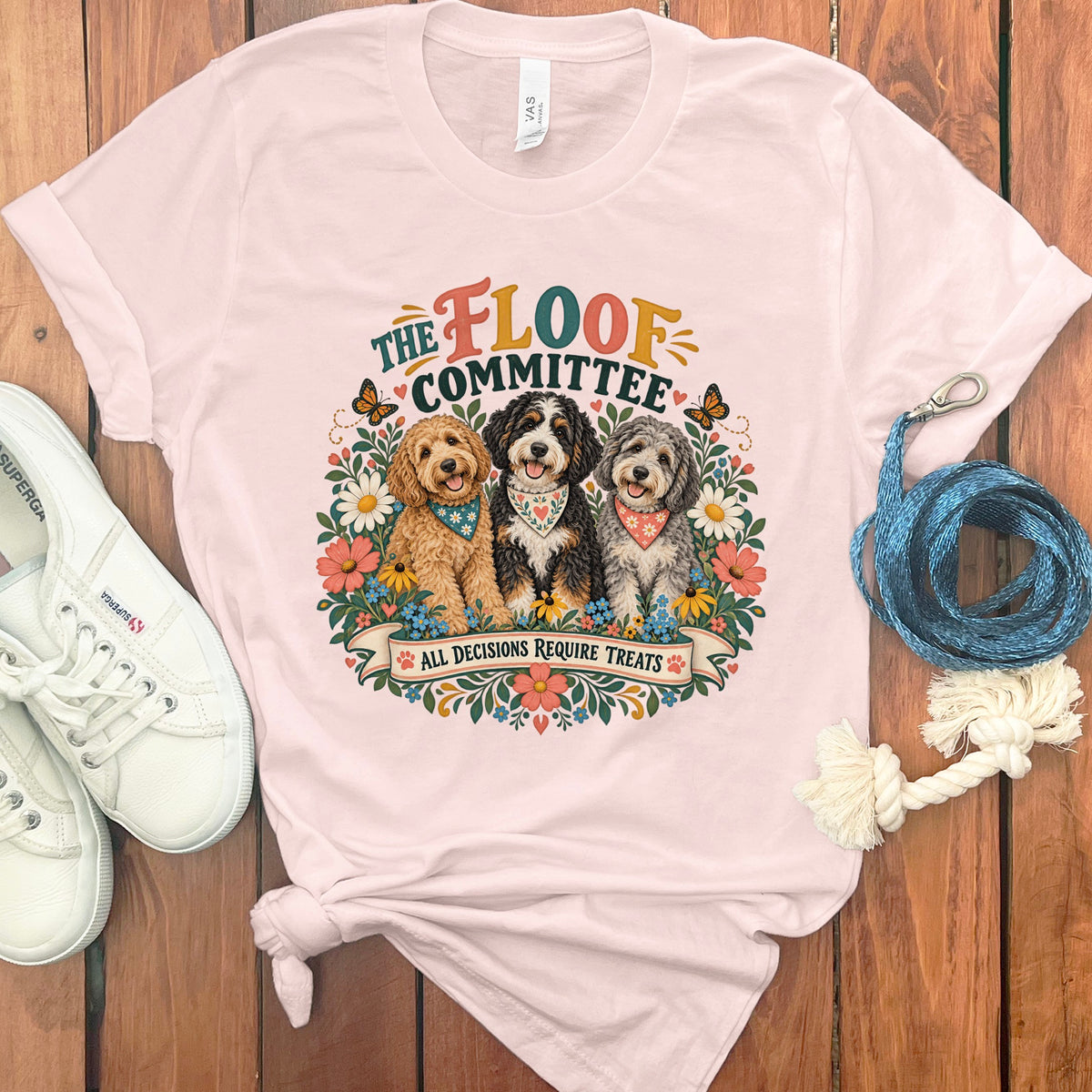 Pink t-shirt with "The Floof Committee" and three dogs graphic.