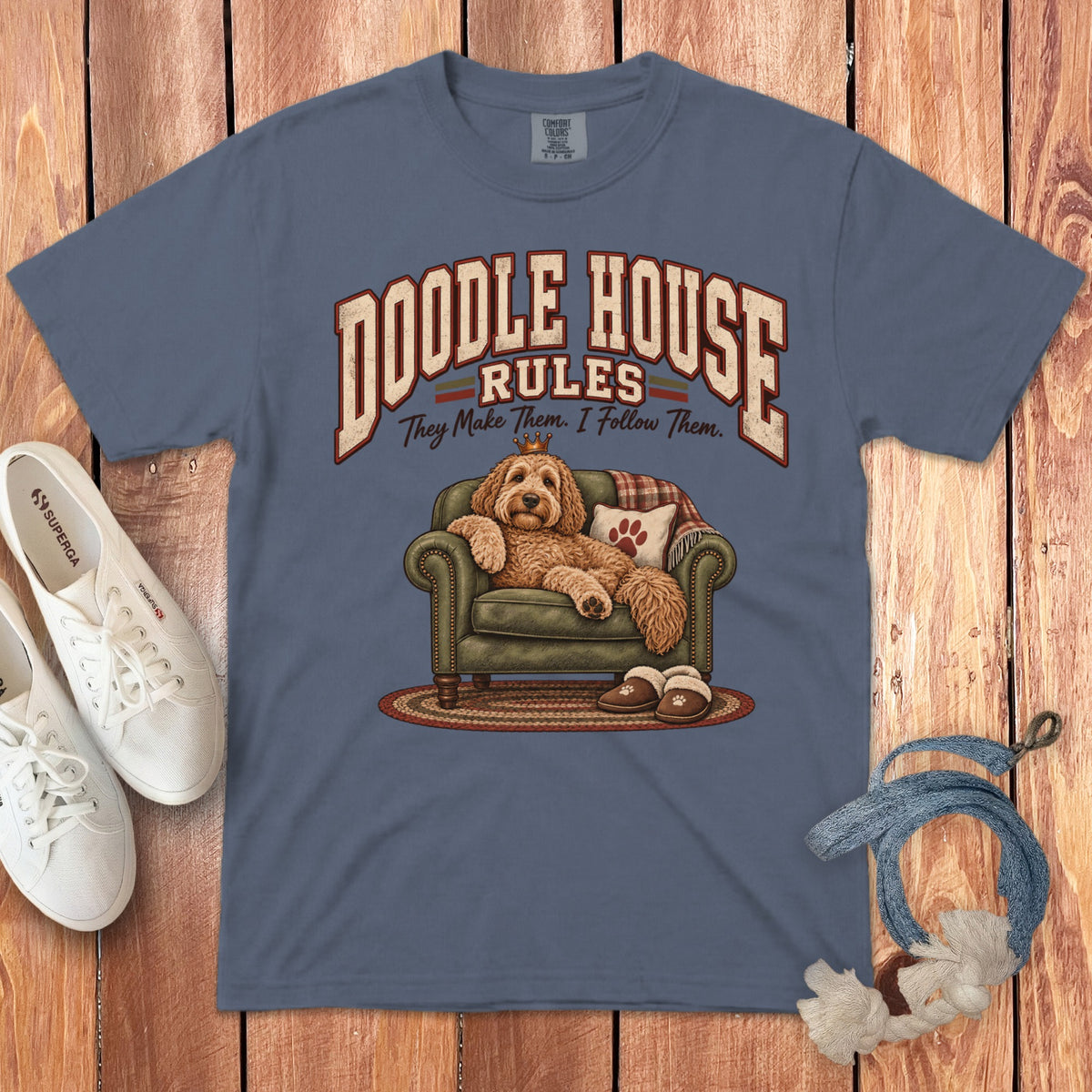Blue t-shirt with "Doodle House Rules They Make Them. I Follow Them." text and dog illustration.