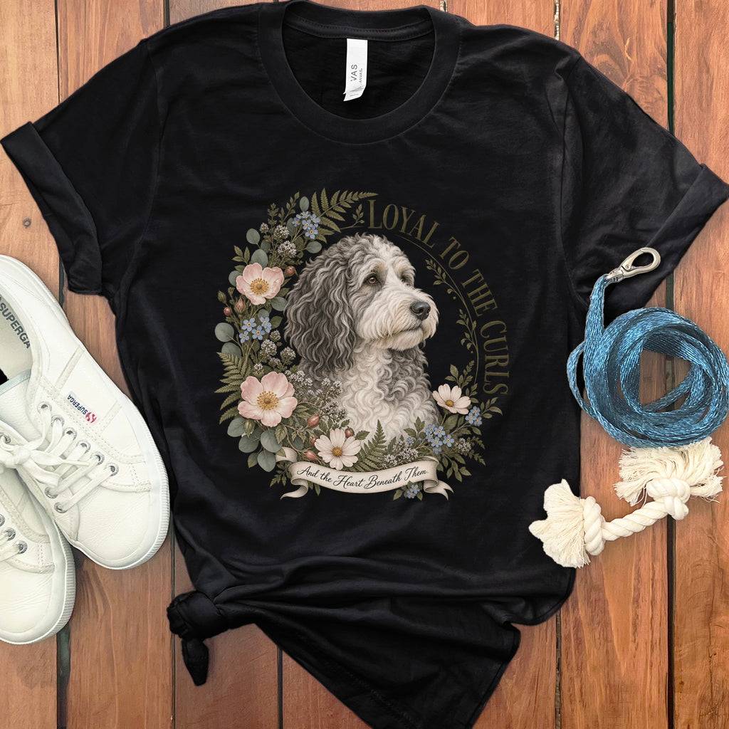 Black t-shirt with a dog portrait, flowers, and text "Loyal to the Curls".