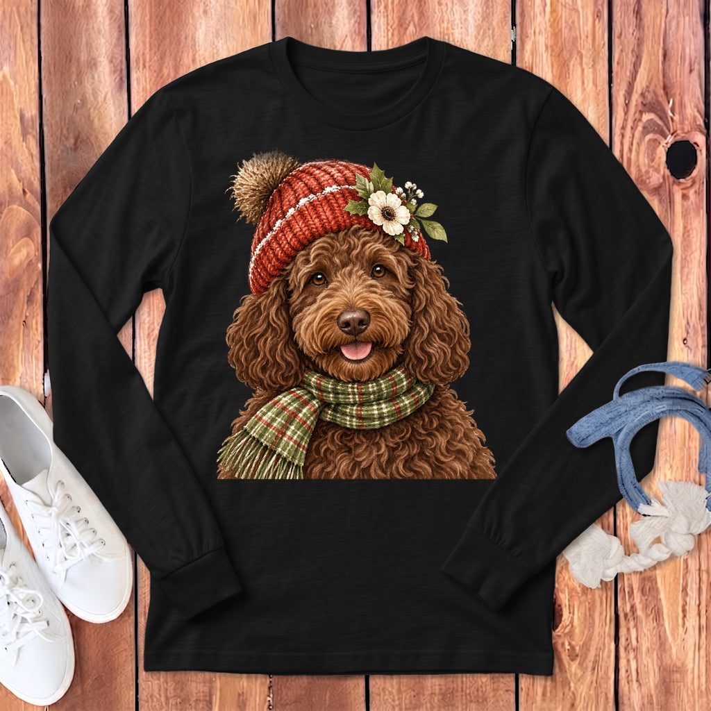 Brown poodle wearing a red knitted hat and green plaid scarf.