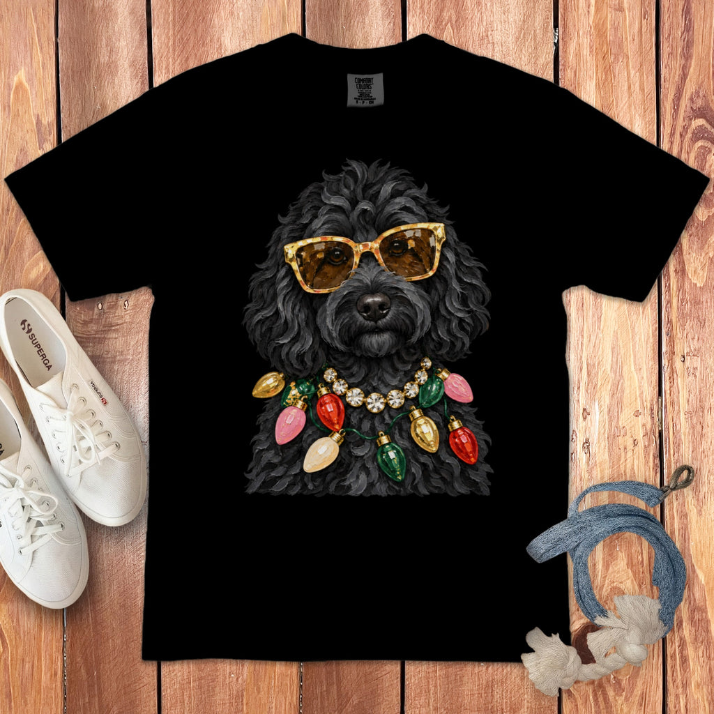 Black t-shirt with a black dog wearing sunglasses and a string of Christmas lights.