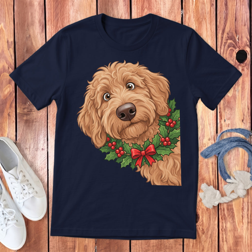 Navy t-shirt with a fluffy dog wearing a holly wreath and red bow.