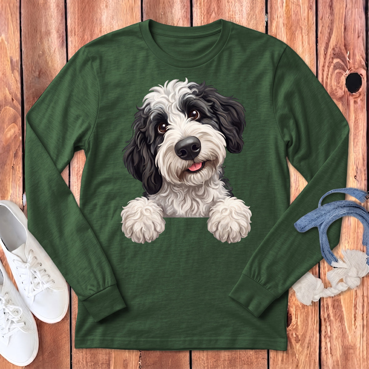 Green long-sleeve shirt with a black and white shaggy dog graphic.