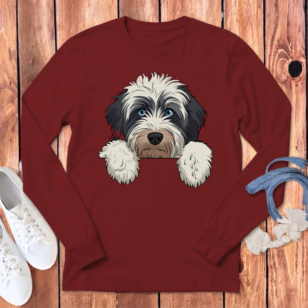 Maroon long-sleeve shirt featuring a cartoon dog with blue eyes.
