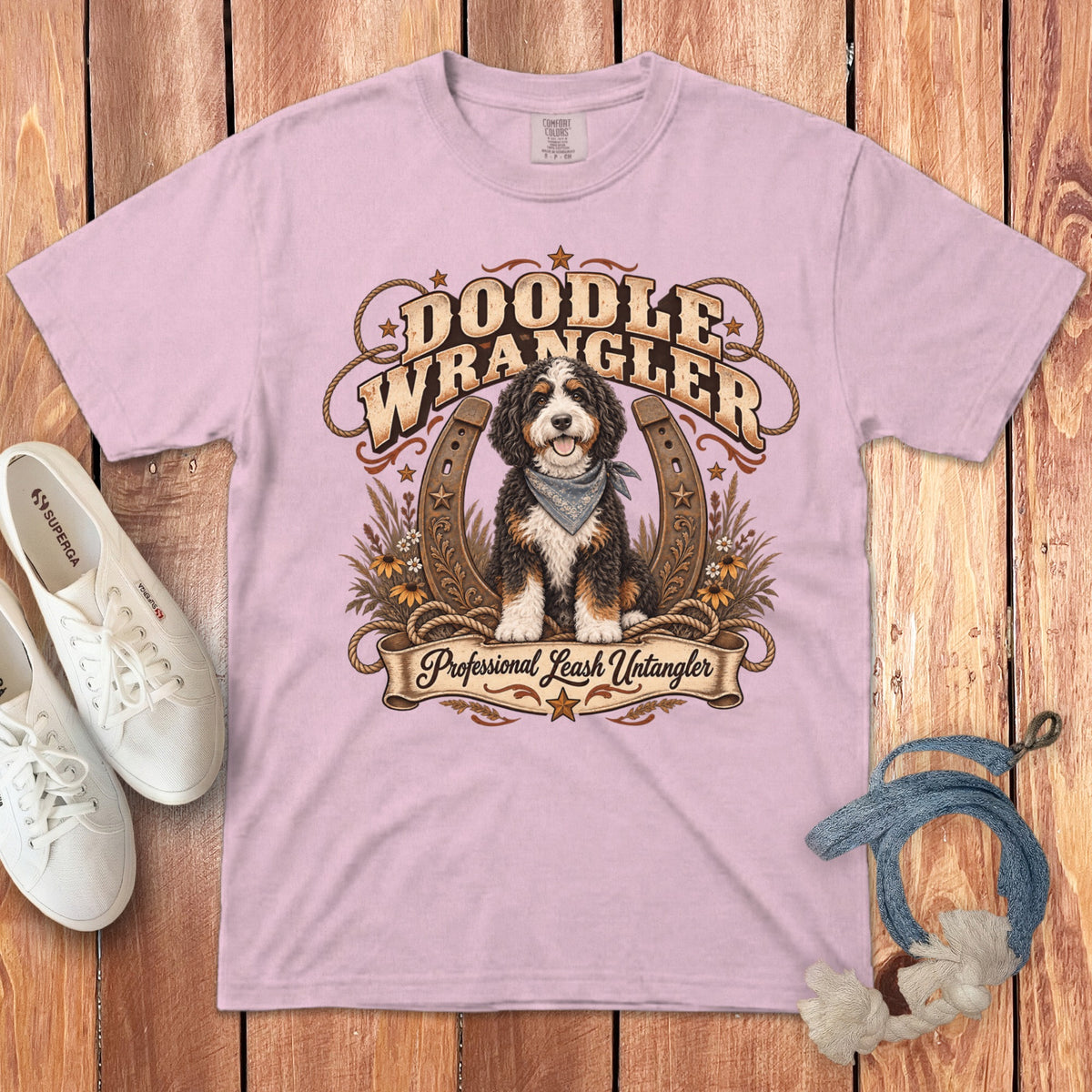 Pink t-shirt with "Doodle Wrangler Professional Leash Untangler" graphic and dog.