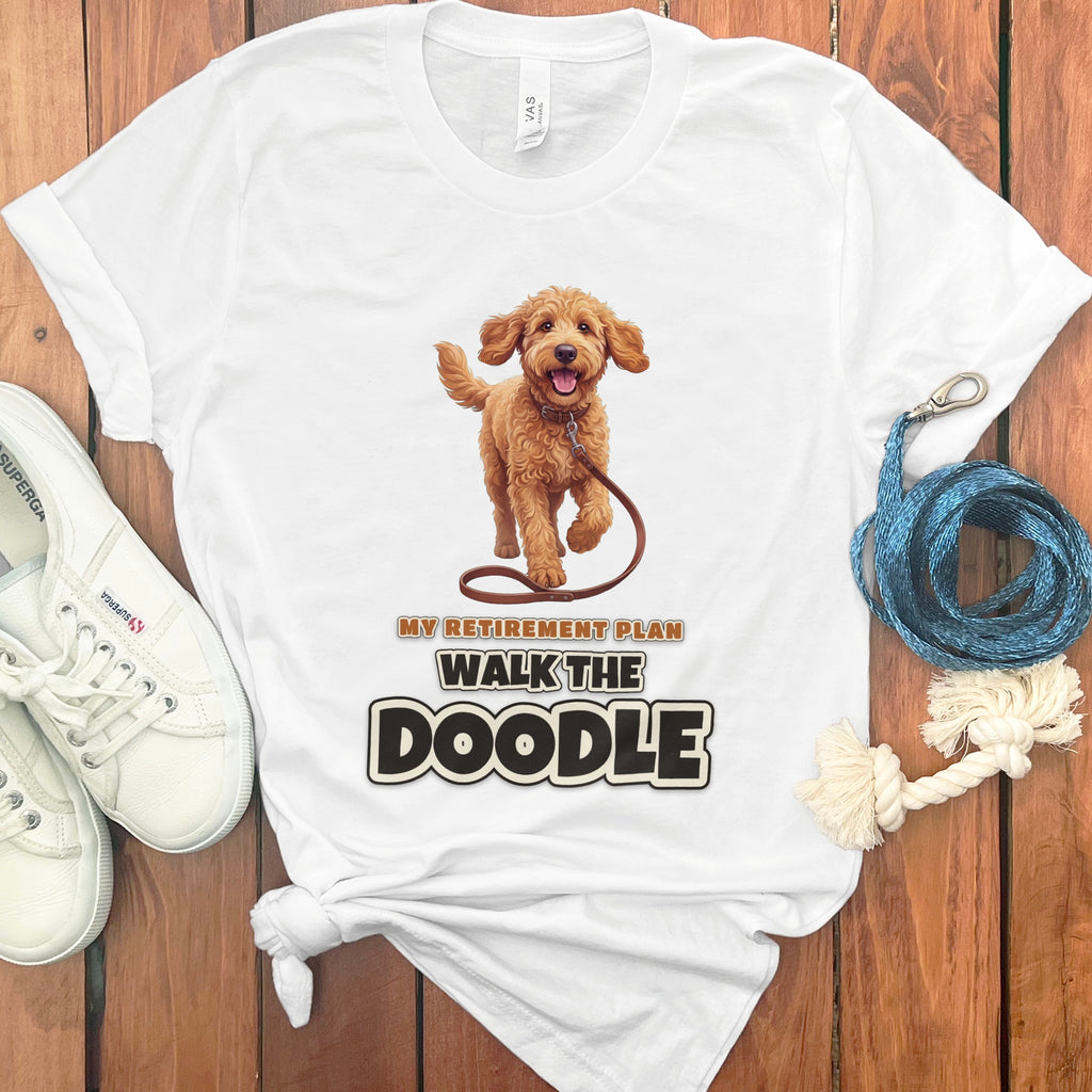 White t-shirt with a doodle dog graphic and text "My Retirement Plan Walk The Doodle."