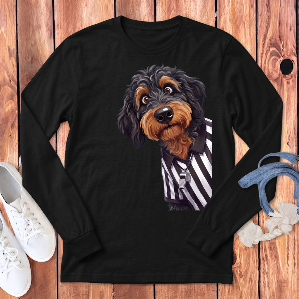 Black long sleeve shirt with a doodle dog wearing a referee shirt and whistle.