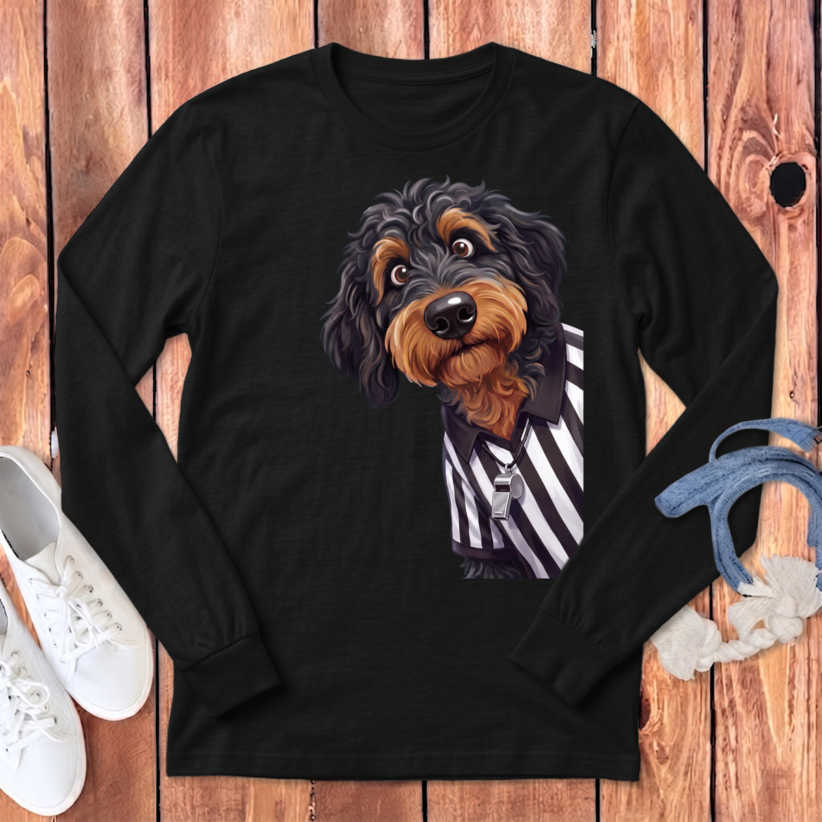 Black long sleeve shirt with a doodle dog wearing a referee shirt and whistle.