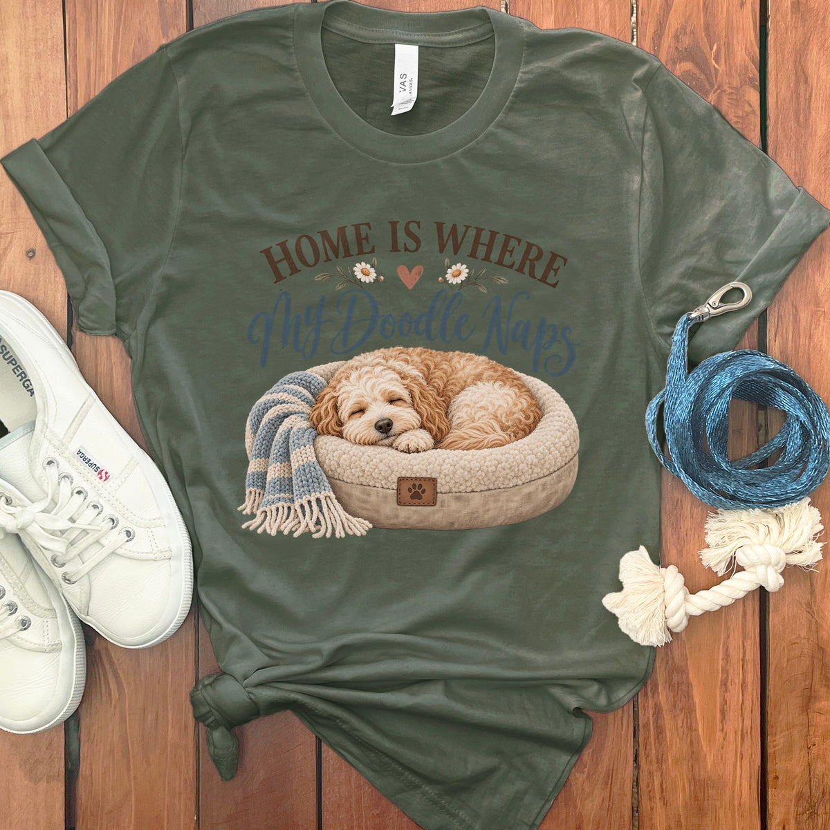 Olive green t-shirt with "Home is Where the Doodle Naps" graphic featuring a sleeping dog.