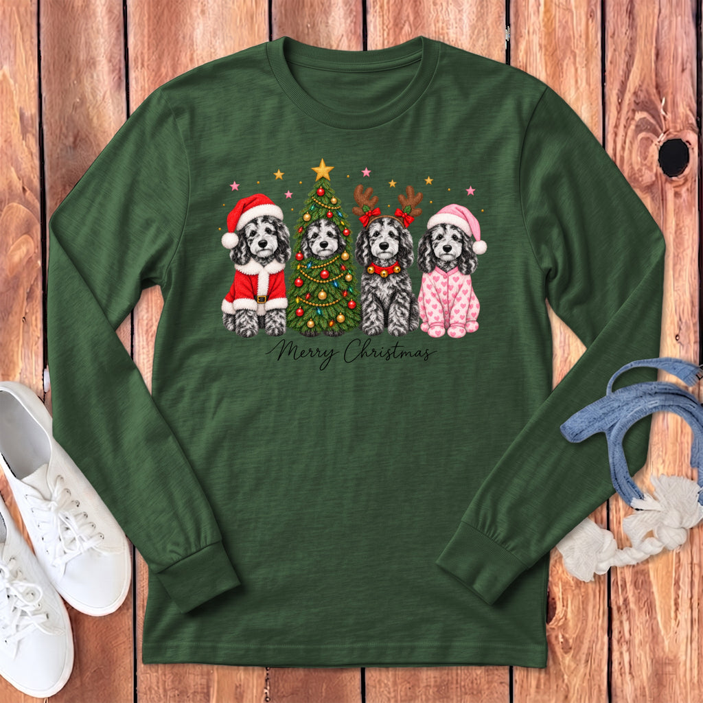 Dark green long-sleeved shirt with a Christmas graphic of four dogs, a decorated tree, and text.