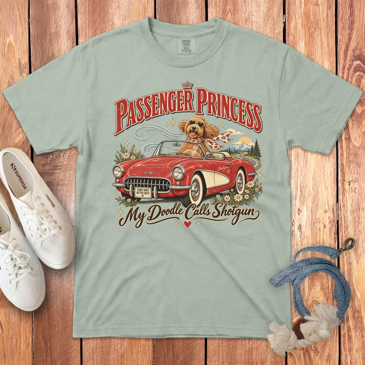 Light green t-shirt with doodle in convertible and text "Passenger Princess My Doodle Calls Shotgun."