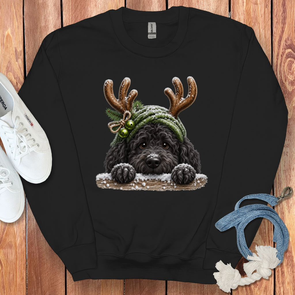 Black sweatshirt with a graphic of a black dog wearing reindeer antlers and a green hat.