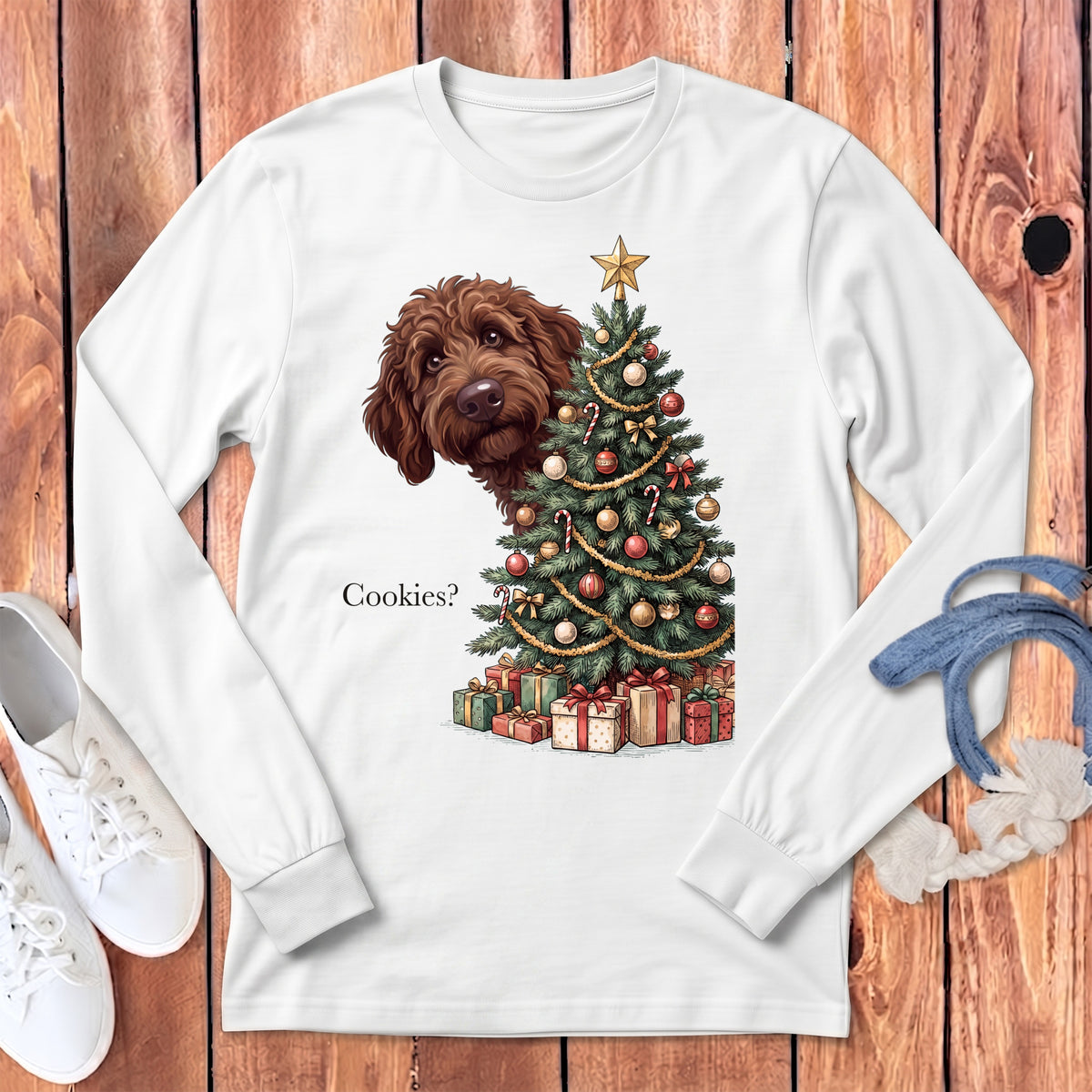 Brown doodle dog peeking behind a Christmas tree with presents and the text "Cookies?".