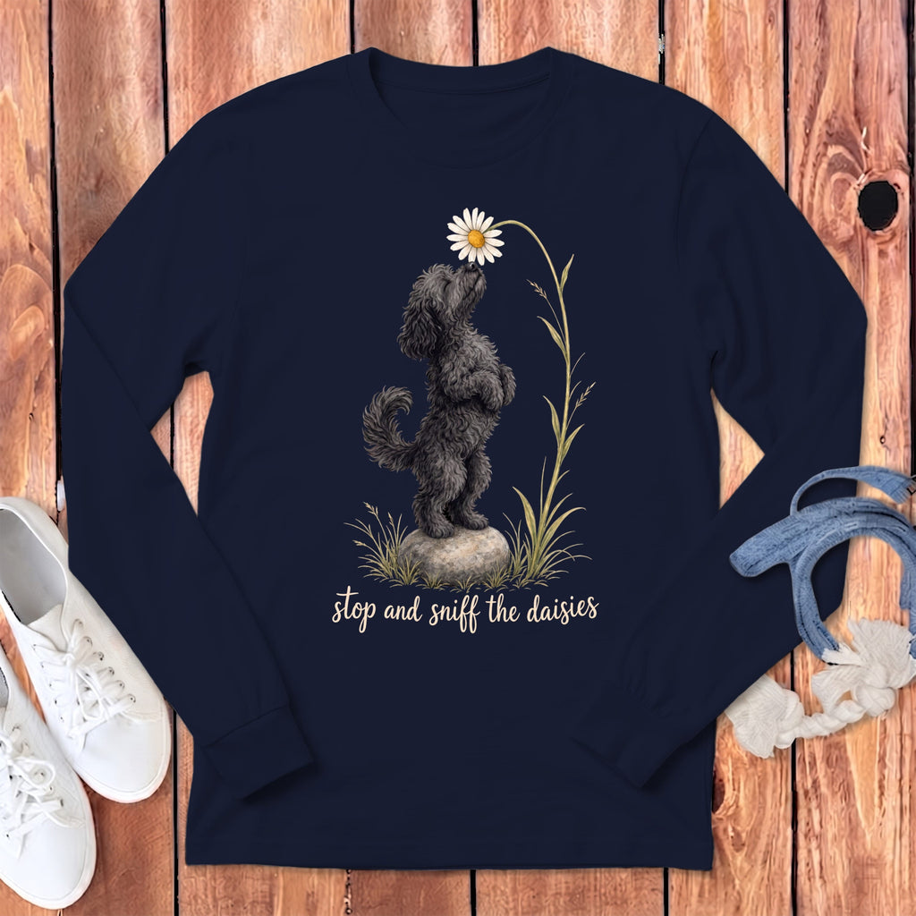 Dark navy long-sleeve shirt with a doodle of a dog sniffing a daisy.