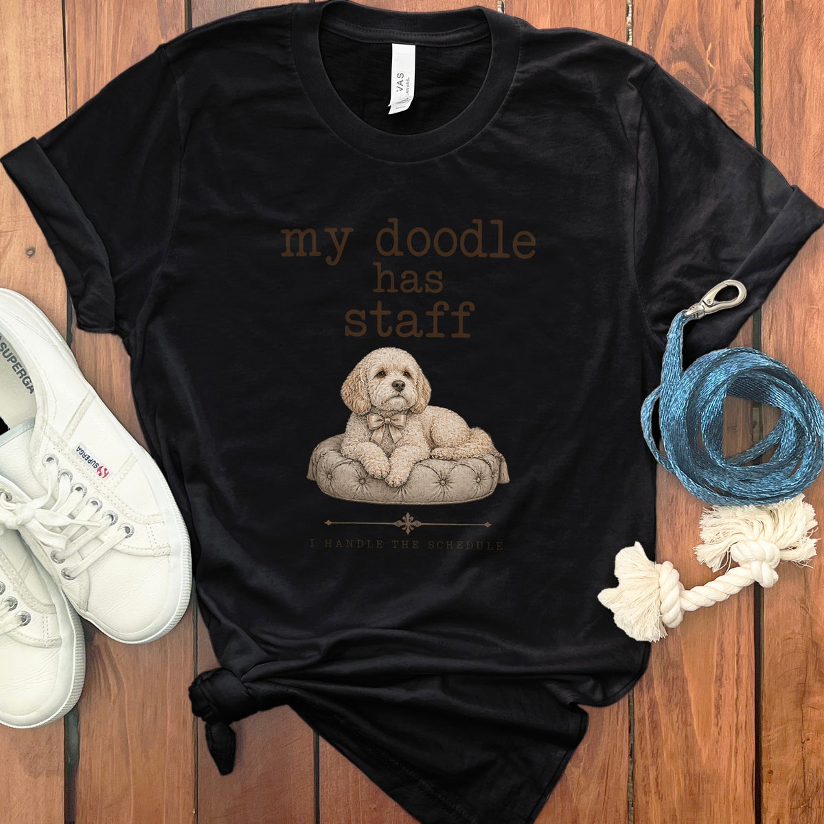 Black t-shirt with "my doodle has staff I handle the schedule" and a dog illustration.