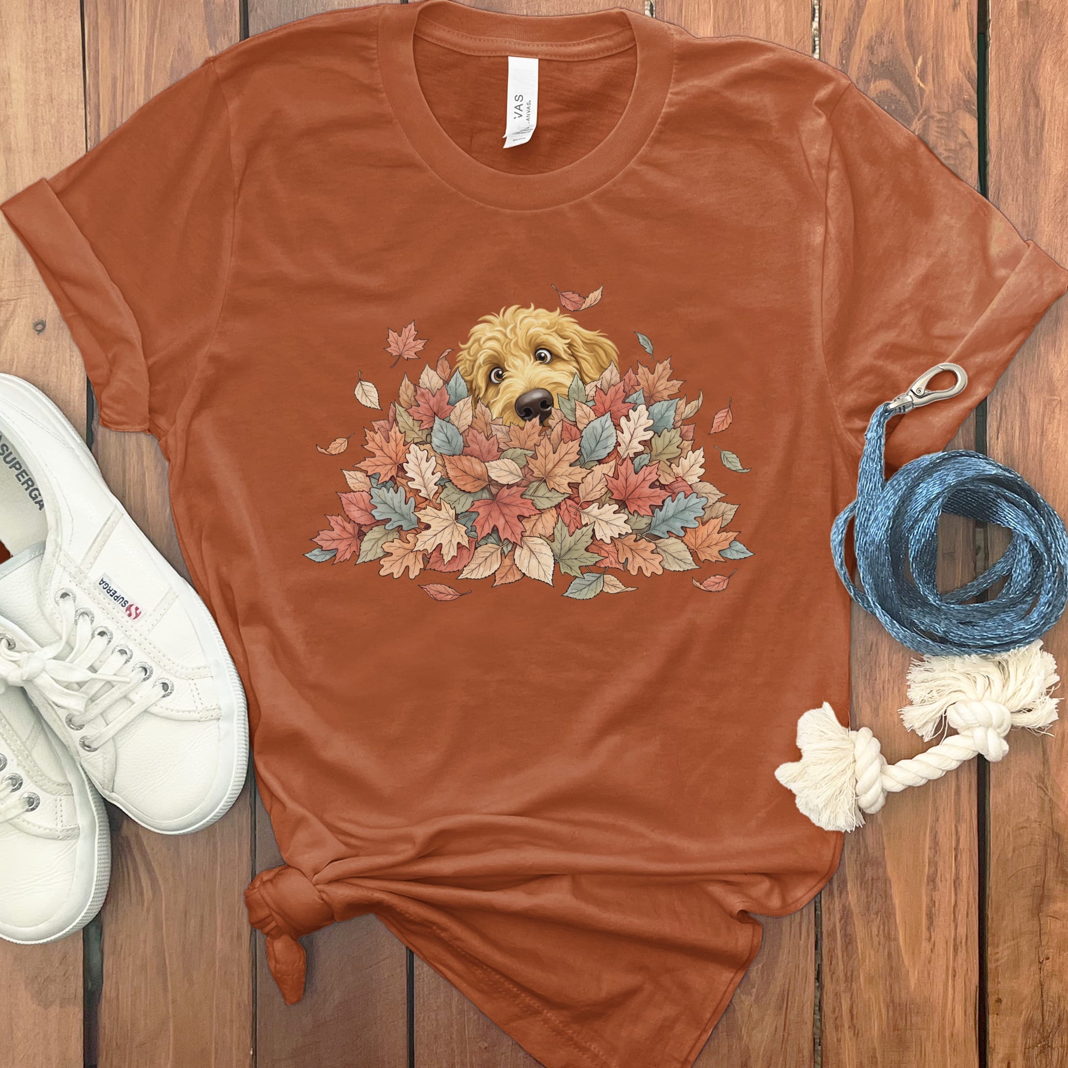 Golden Goldendoodle Peeking Leaf Pile T-Shirt in Autumn / S by Puppy Jo