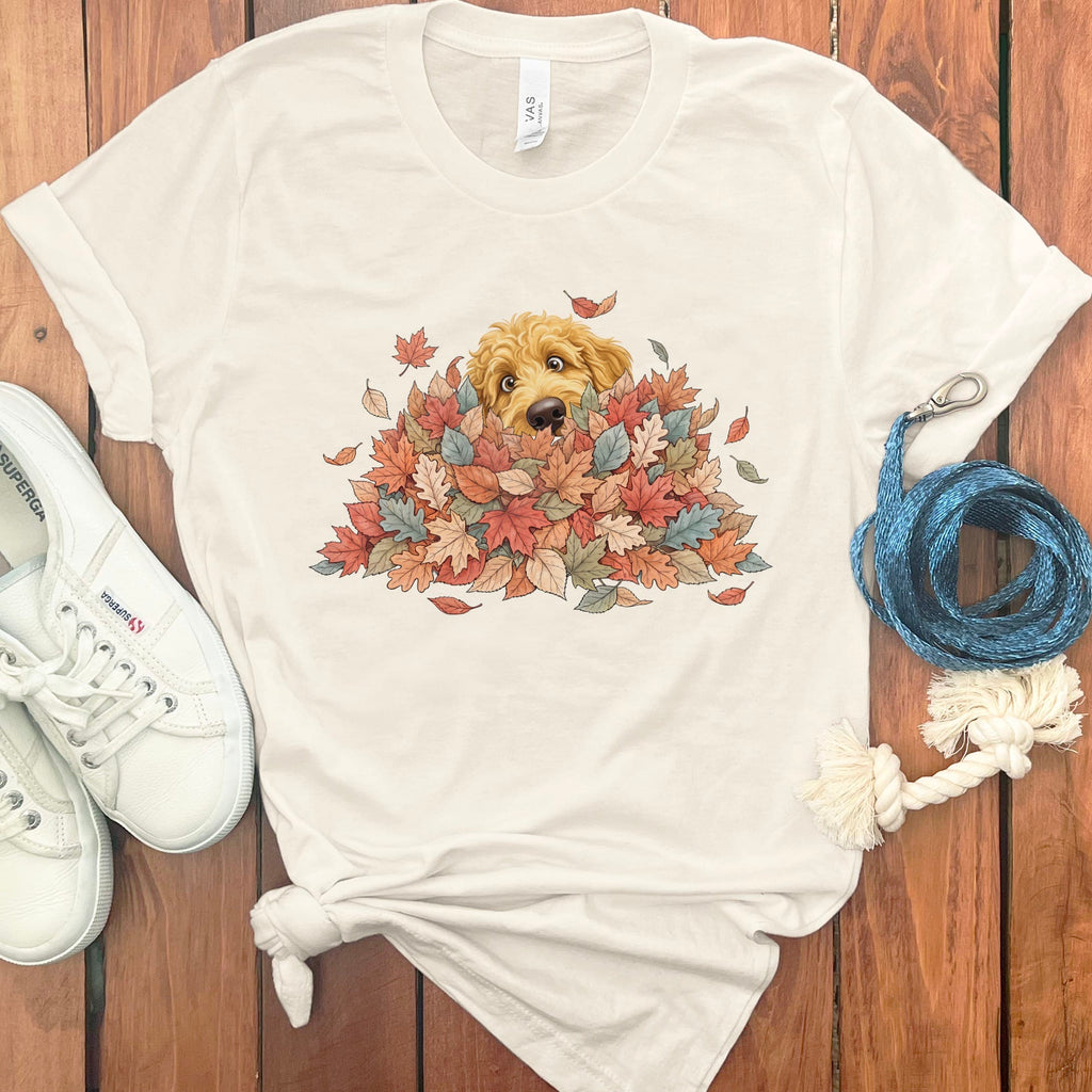 Golden Goldendoodle Peeking Leaf Pile T-Shirt in Natural / S by Puppy Jo