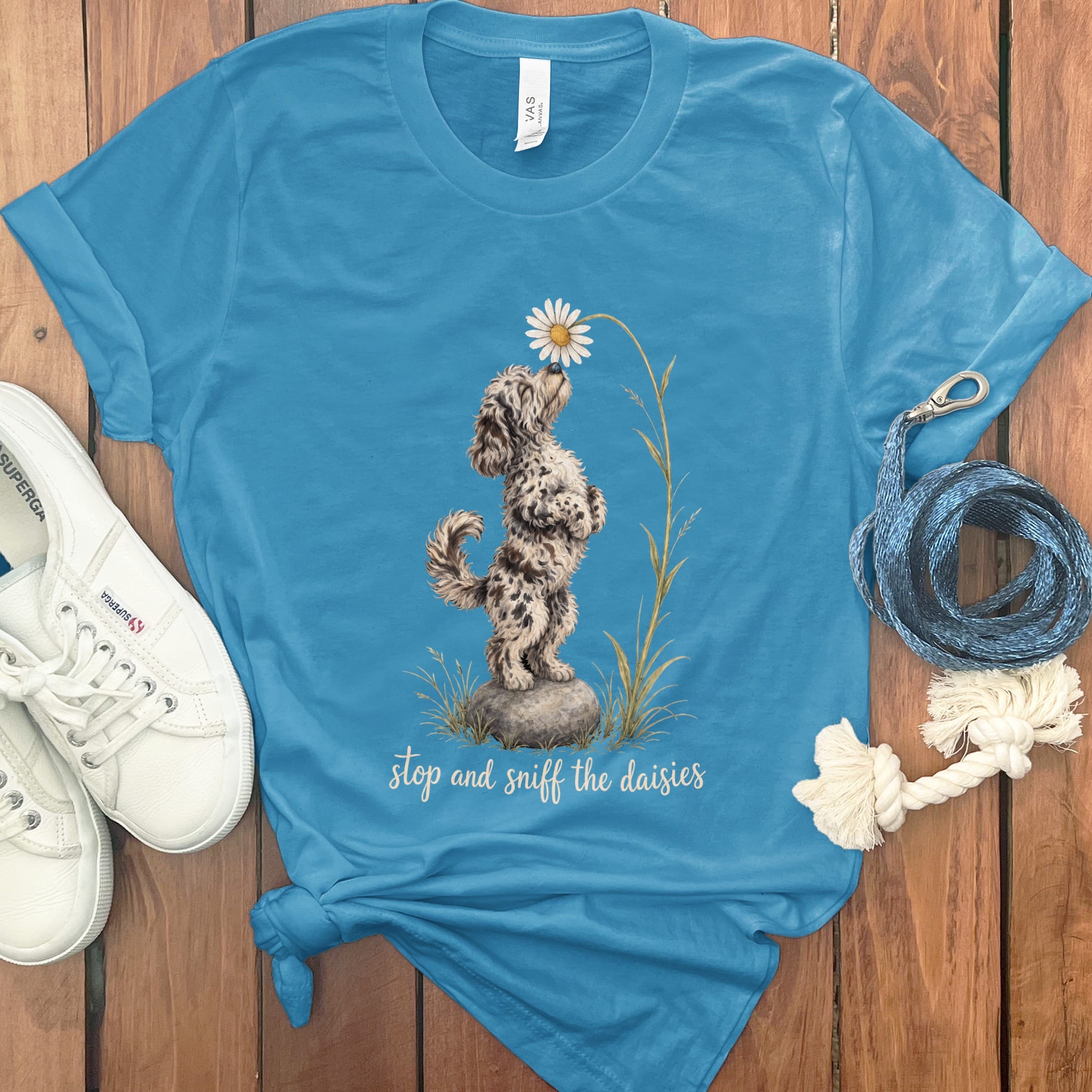 Merle Goldendoodle Sniff Daisies T-Shirt in Aqua / S by Puppy Jo