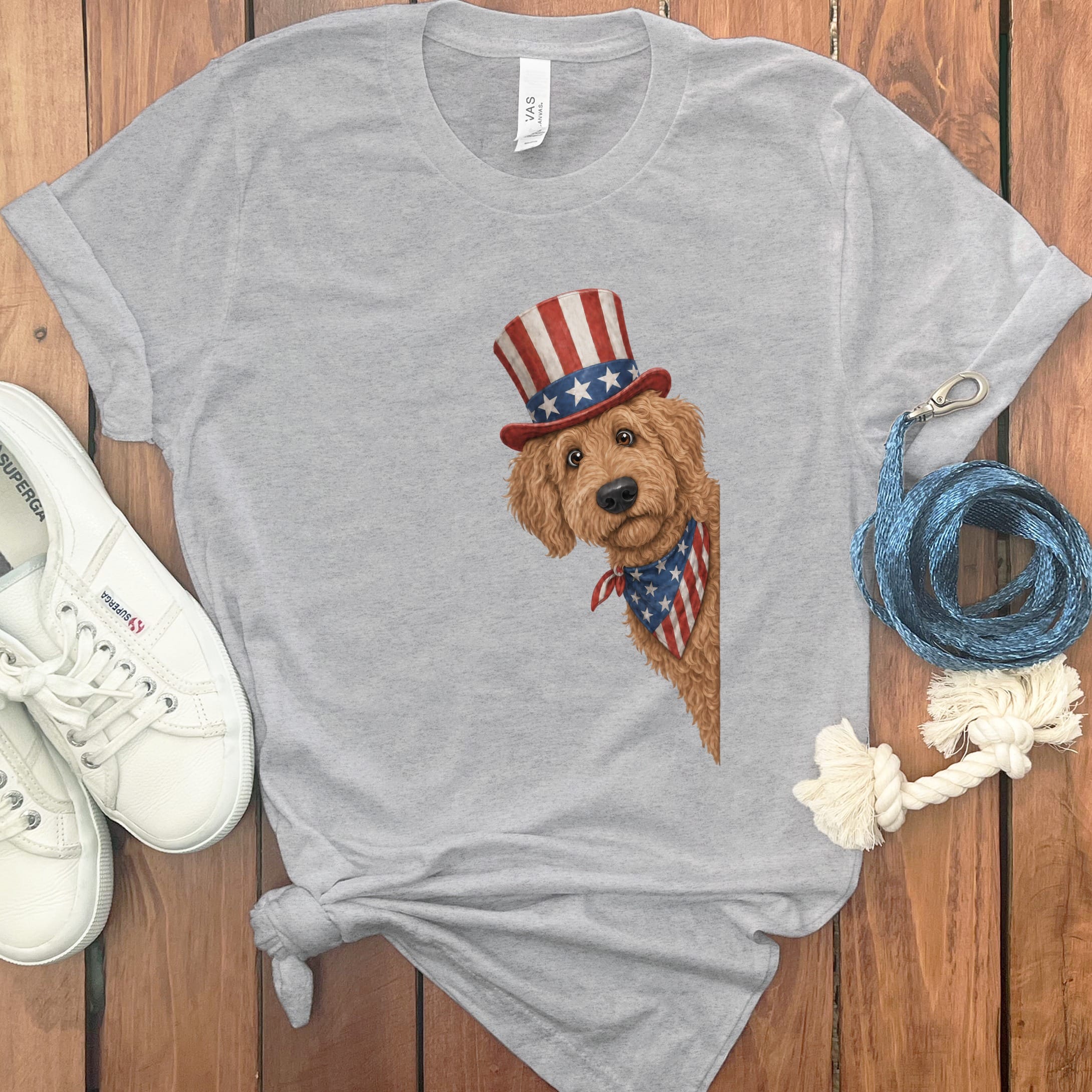 Patriotic Peeking Apricot Goldendoodle T-Shirt in Athletic Heather / S by Puppy Jo