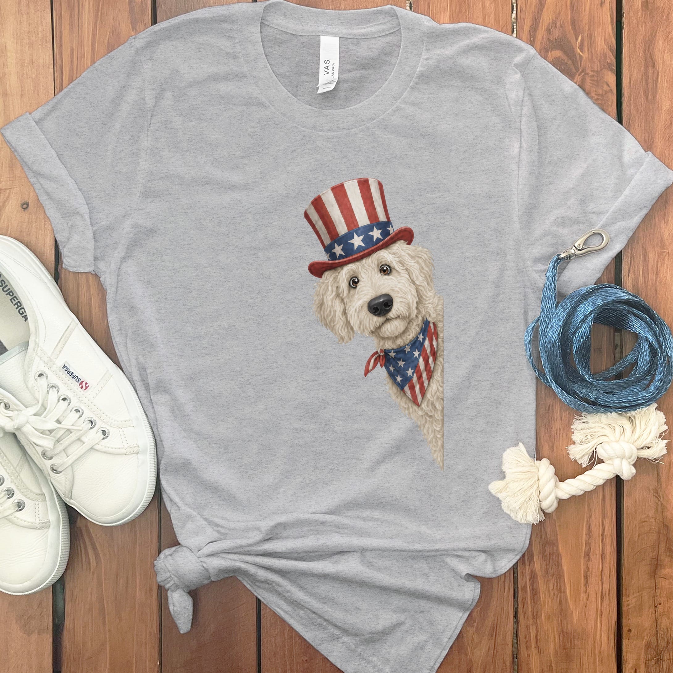Patriotic Peeking Cream Goldendoodle T-Shirt in Athletic Heather / S by Puppy Jo