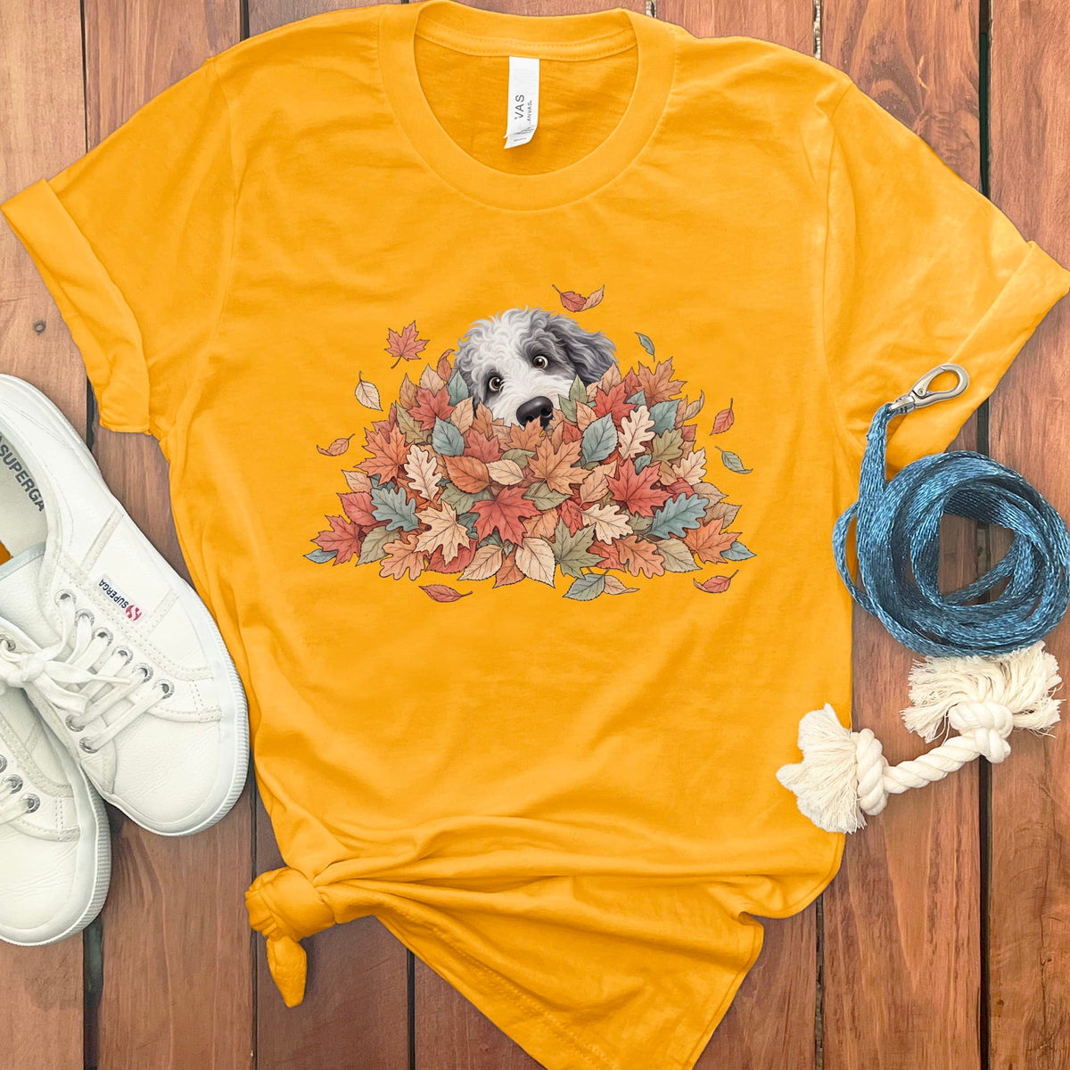 Sheepadoodle Peeking Leaf Pile T-Shirt in Gold / S by Puppy Jo